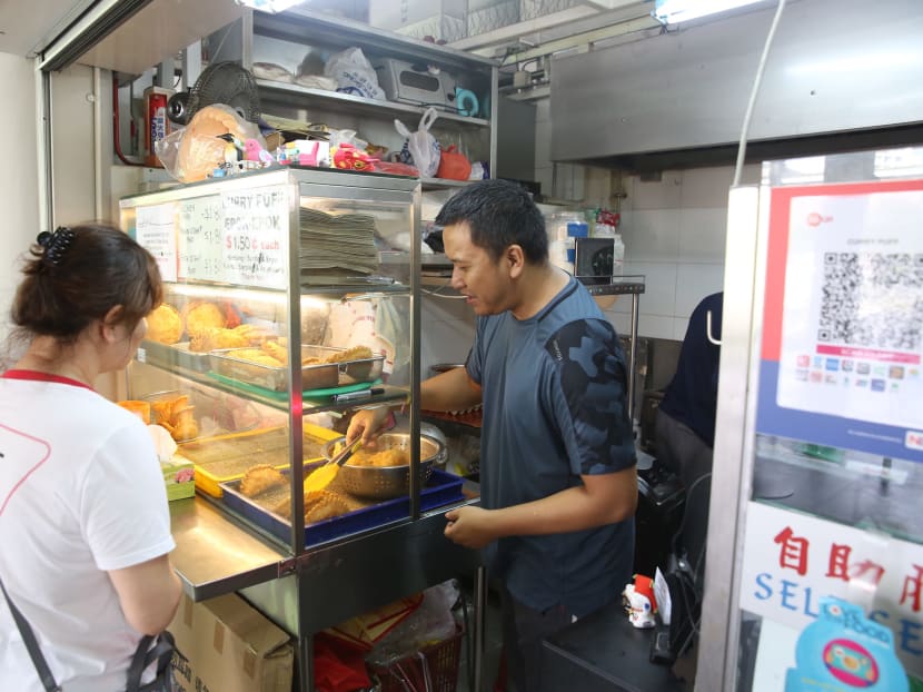 People from various parts of Singapore visited this curry puff stall in Yishun Park Hawker Centre after learning about how it had been victims of theft.