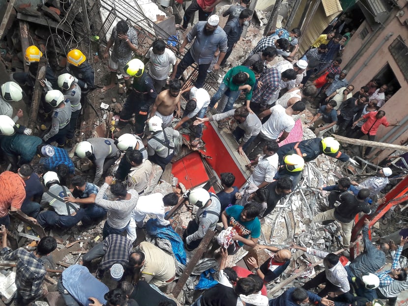 Photo of the day: Rescue workers and residents search for survivors at the site of a collapsed building in Mumbai, India, on Tuesday, July 16, 2019.