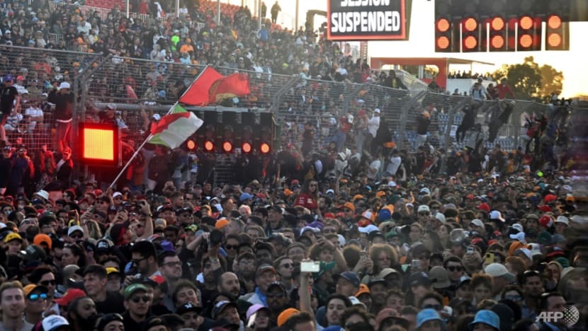 Australian F1 chief vows investigation after fans invade track Australian F1 chief vows investigation after fans invade track