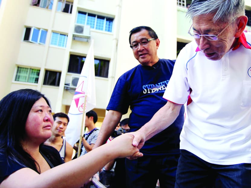 Mr Chiam See Tong from Singapore People’s Party shaking a teary supporter’s hand at Potong Pasir in 2011. TODAY file photo