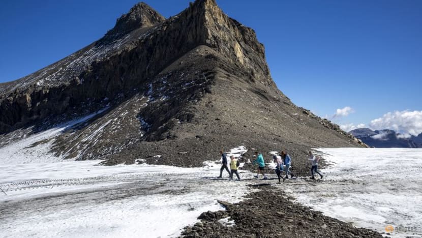 Rocky path revealed between Swiss glaciers in extreme melt season Rocky path revealed between Swiss glaciers in extreme melt season