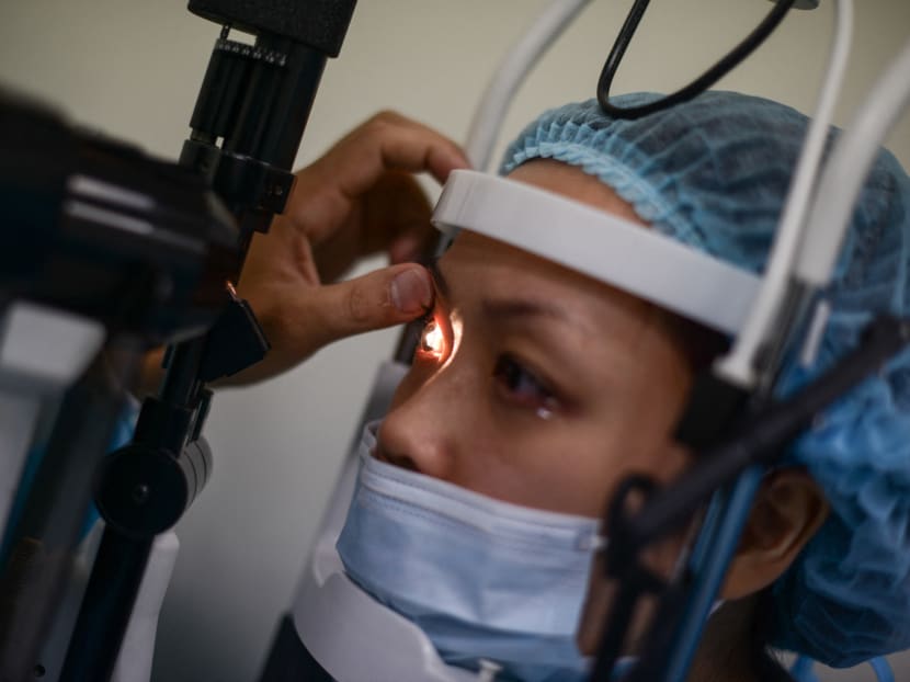 File photo of a patient at an eye clinic in Singapore.