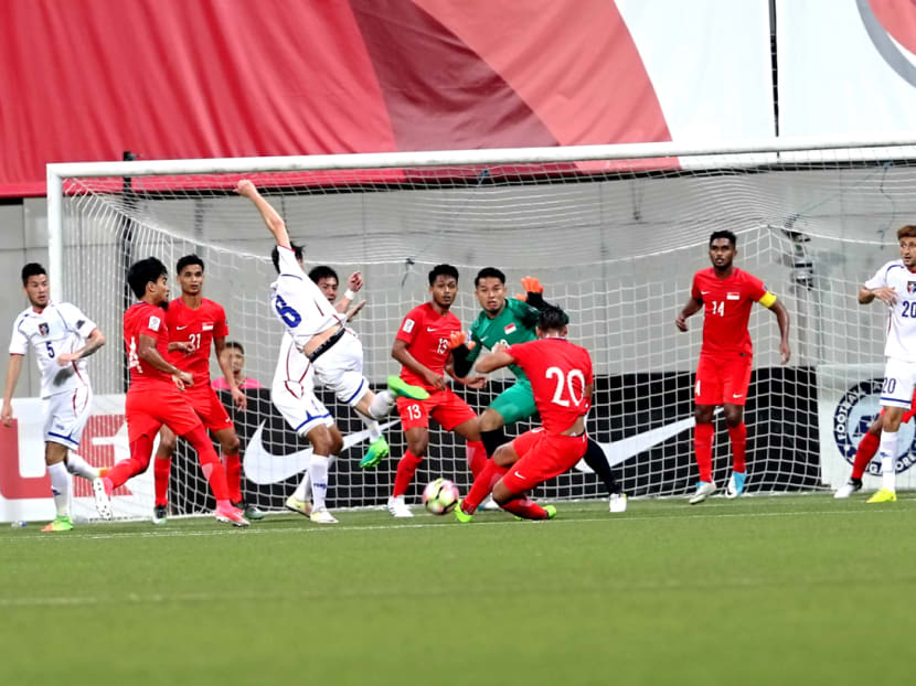 Taiwan's Xavier Chen (No. 8) scoring the equaliser against Singapore. Taiwan went on to win 2-1, a result which sent Singapore to the bottom of the group. Photo: Nuria Ling/TODAY
