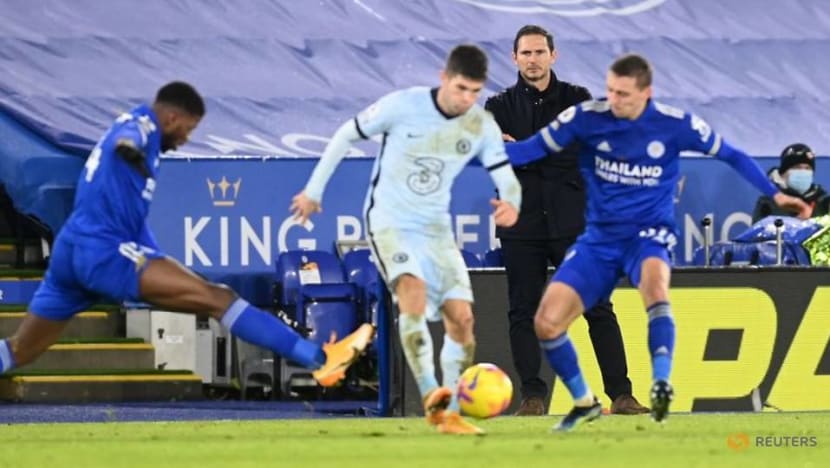 Football: Leicester go top with 2-0 win over Chelsea Football: Leicester go top with 2-0 win over Chelsea