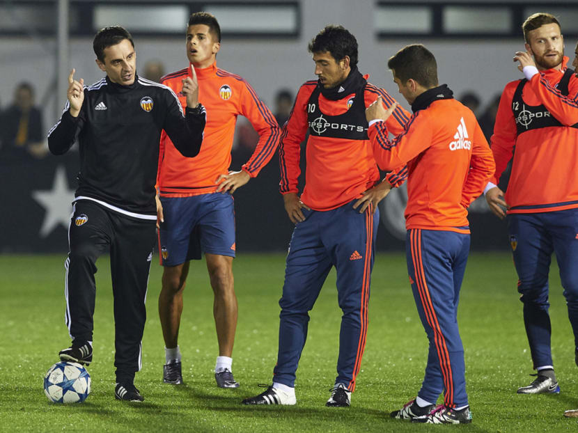 Gary Neville’s (left) appointment as manager of Valencia has given the players new enthusiasm, as per their 1-1 draw with Barcelona. Photo: Getty Images