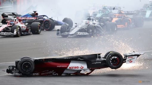 Protesters storm British GP track after crash