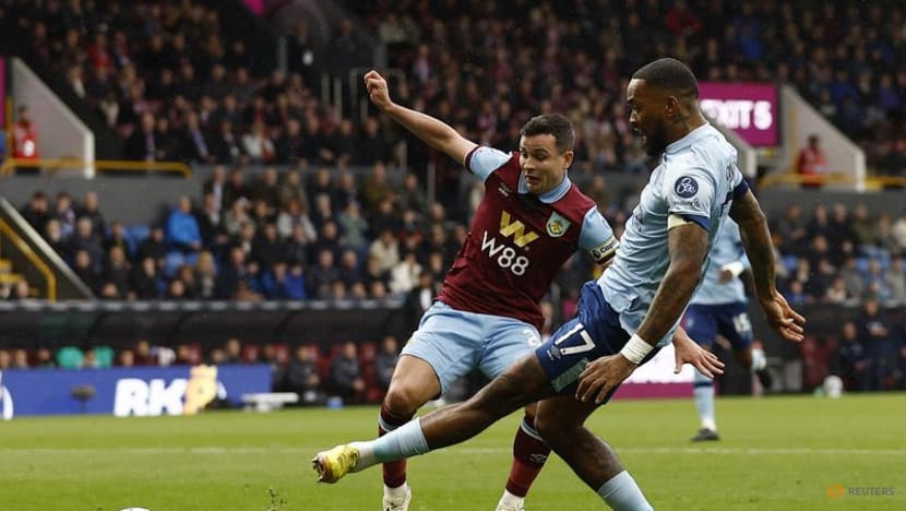 Burnley hang on to beat 10 man Brentford in relegation battle CNA