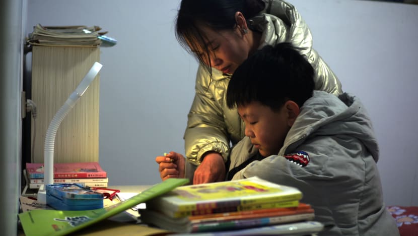 parent helps student with his homework 1