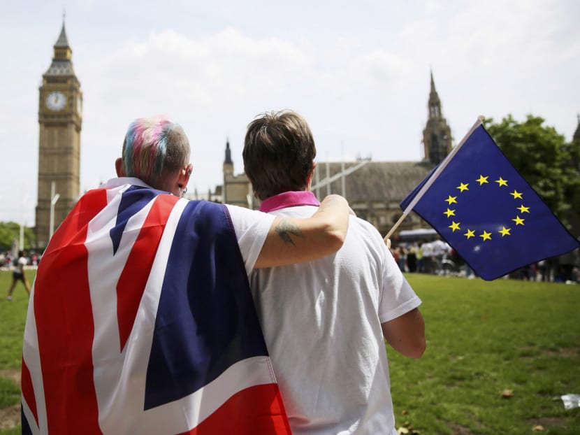 Participants looking at the Big Ben clock after attending a pro-EU referendum event on Sunday in London. Chances of a ‘Leave’ vote have faded since the murder of pro-European lawmaker Jo Cox last Thursday. The probability of a ‘Remain’ vote rose to 78 per cent yesterday, said Betfair. Photo: Reuters