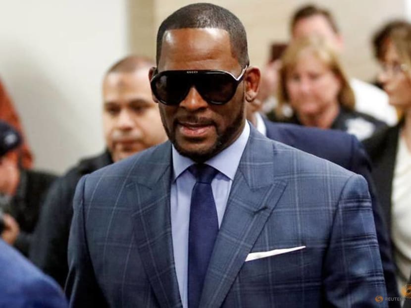 R Kelly arrested on child pornography, other charges R Kelly arrested on child pornography, other charges
