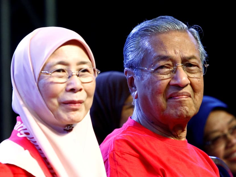 Deputy Prime Minister Ahmad Zahid Hamidi said sarcastically that there was no other person more qualified to bring damage and ruin to the country than Dr Mahathir, seen here with opposition leader Wan Azizah. Photo: Reuters