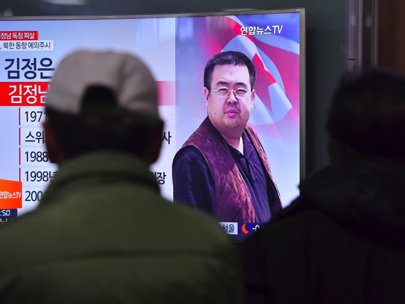 People watch a television showing news reports of Kim Jong-Nam, the half-brother of North Korean leader Kim Jong-Un. Photo: AFP