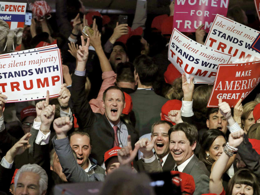 Trump supporters celebrating as returns come in for Republican US presidential nominee Donald Trump during an election rally in Manhattan, New York, last night. Photo: Reuters
