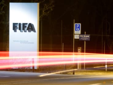 FILE PHOTO: A long exposure shows FIFA's logo near its headquarters in Zurich, Switzerland February 27, 2022. REUTERS/Arnd Wiegmann/File Photo