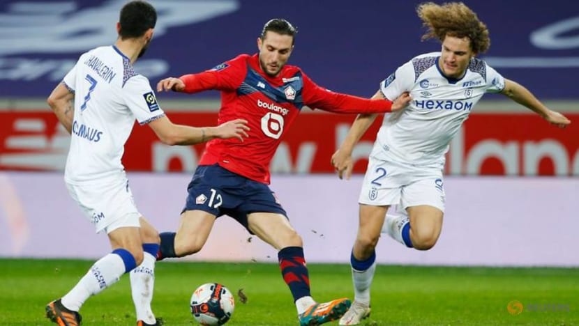 Last-gasp David strike earns Lille 2-1 win against Reims Last-gasp David strike earns Lille 2-1 win against Reims