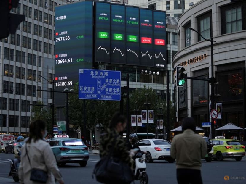 FILE PHOTO: A view of a giant display of stock indexes, following the coronavirus disease (COVID-19) outbreak, in Shanghai, China October 24, 2022. REUTERS/Aly Song