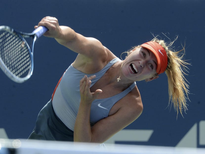 Maria Sharapova of Russia during a fourth-round women's singles match against Caroline Wozniacki of Denmark in Arthur Ashe Stadium at the U.S. Open tennis tournament in New York, Aug. 31, 2014. Photo: The New York Times