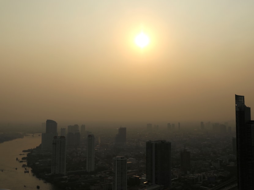 The sun sets over a smoggy Bangkok on January 29. The sun sets over a smoggy Bangkok on January 29.