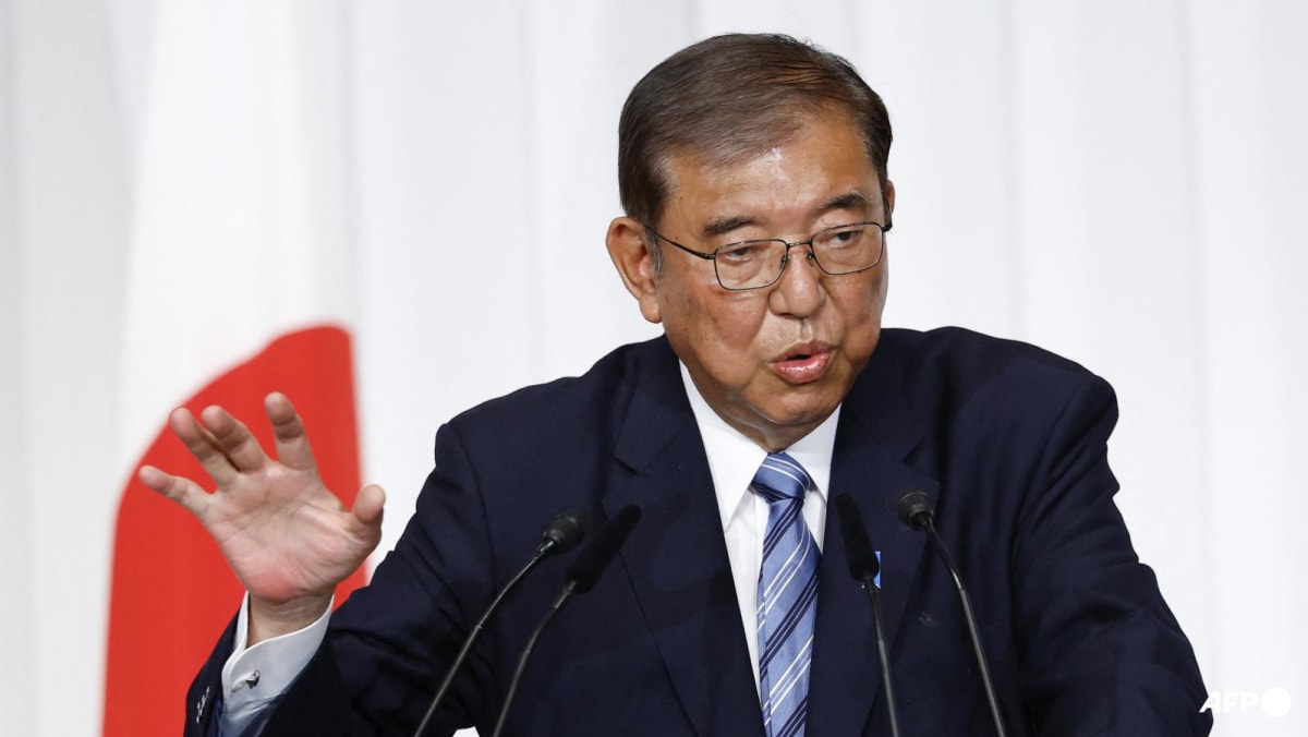 Japan PM vows to stay on despite election debacle Japan PM vows to stay on despite election debacle