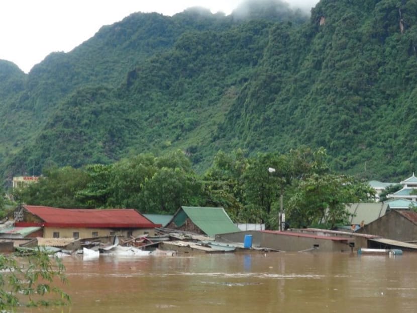 Gallery: Floods kill 24 in Vietnam as Typhoon Sarika looms