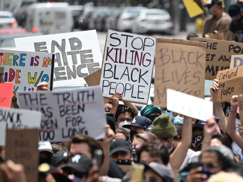 Demonstrators march through the streets of Hollywood, California, on June 2, 2020, to protest the death of George Floyd at the hands of police.