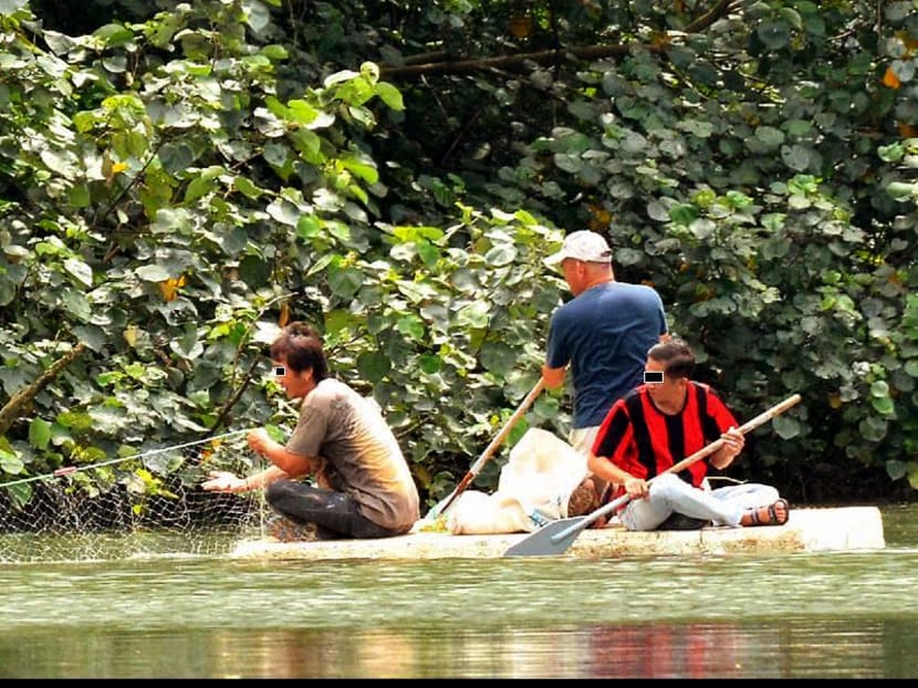 A group of individuals allegedly fishing illegally at the Sungei Buloh Wetland Reserve. PHOTO: NATURE TREKKER
