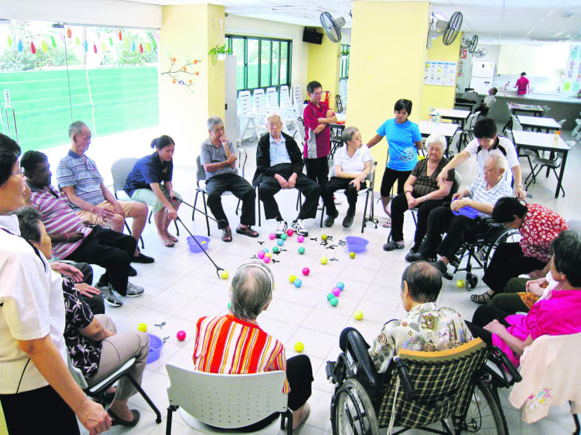 Seniors at a St Luke’s ElderCare centre playing a game during a day-care programme. The centre’s Yishun branch will begin introducing the weekend respite service 
in September. Photo: St Luke’s Eldercare