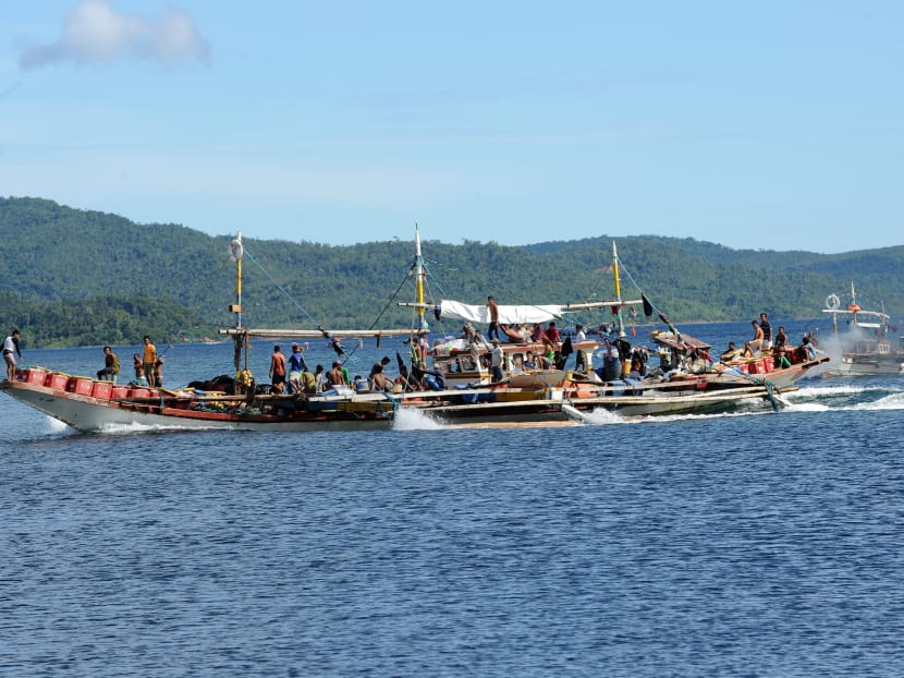 Filipino fishermen heading out to the South China Sea. Photo: AFP