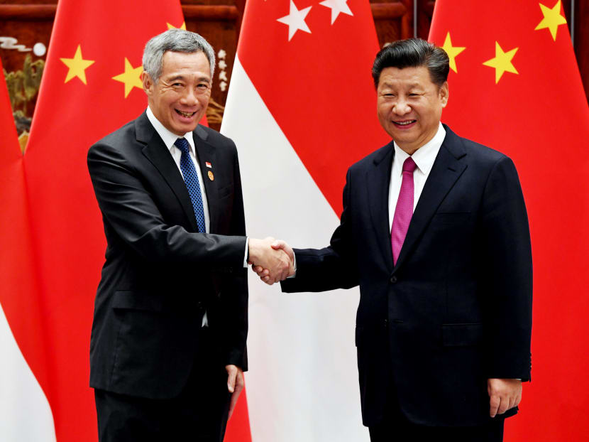 Singapore happy for a prospering China to play a “constructive and positive role” in the region, said Prime Minister Lee Hsien Loong. Mr Lee is pictured here with Chinese President Xi Jinping at a meeting in Hangzhou, China, in September 2016. Photo: REUTERS
