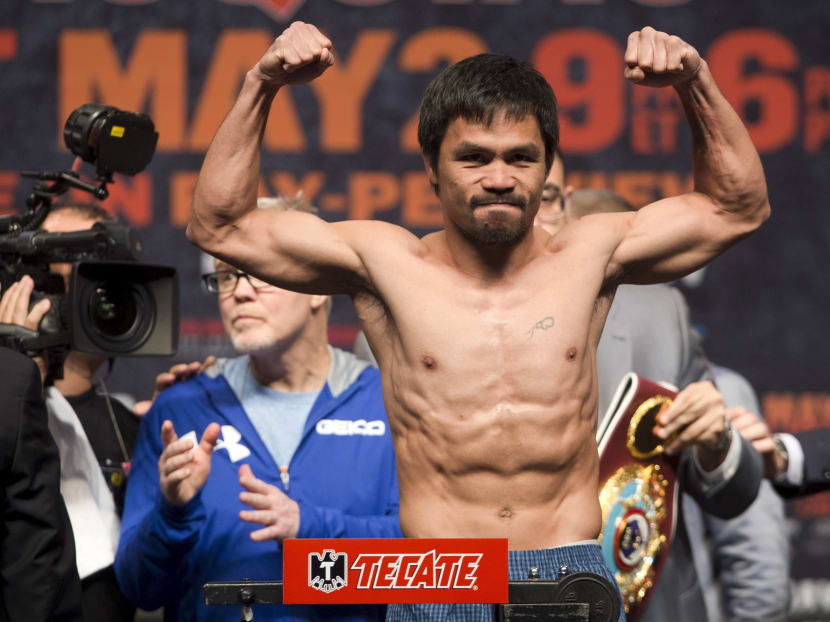 Floyd Mayweather, Manny Pacquiao make weight for megafight