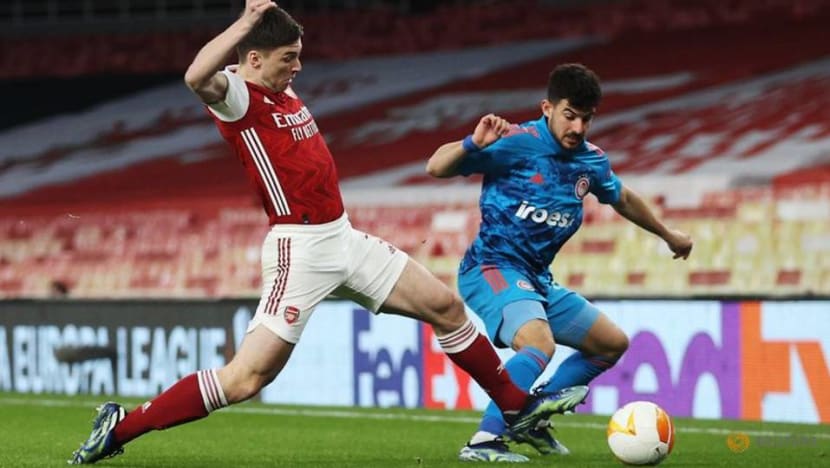Football: Arsenal reach last eight despite defeat by Olympiakos Football: Arsenal reach last eight despite defeat by Olympiakos