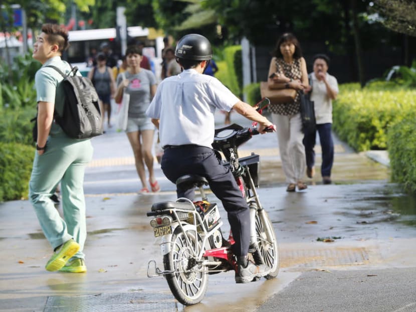 Pedestrians have to give way to e-bikes and e-scooters to avoid being hit, especially on old and narrow pedestrian walkways. TODAY File Photo
