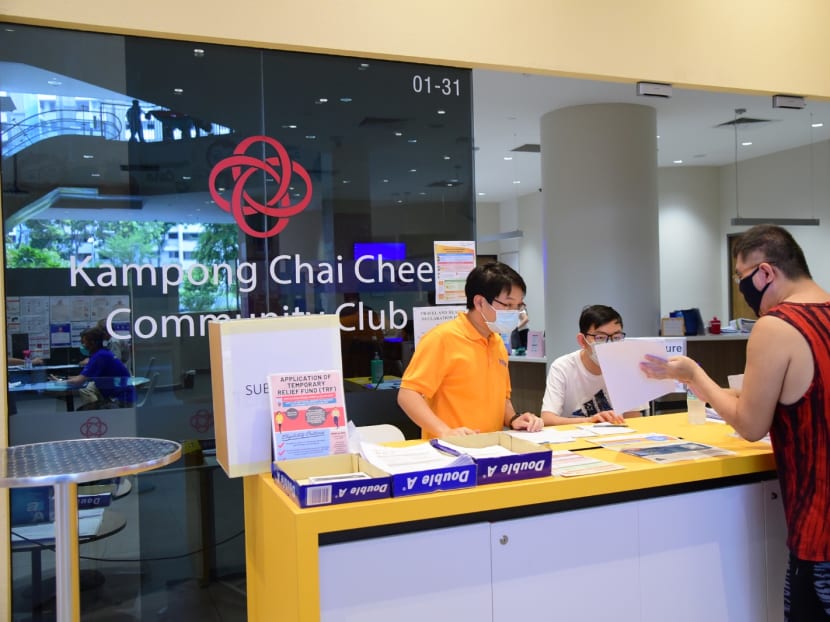 A resident making enquiries at Kampong Chai Chee Community Club, which is run by the People's Association. A resident making enquiries at Kampong Chai Chee Community Club, which is run by the People's Association.