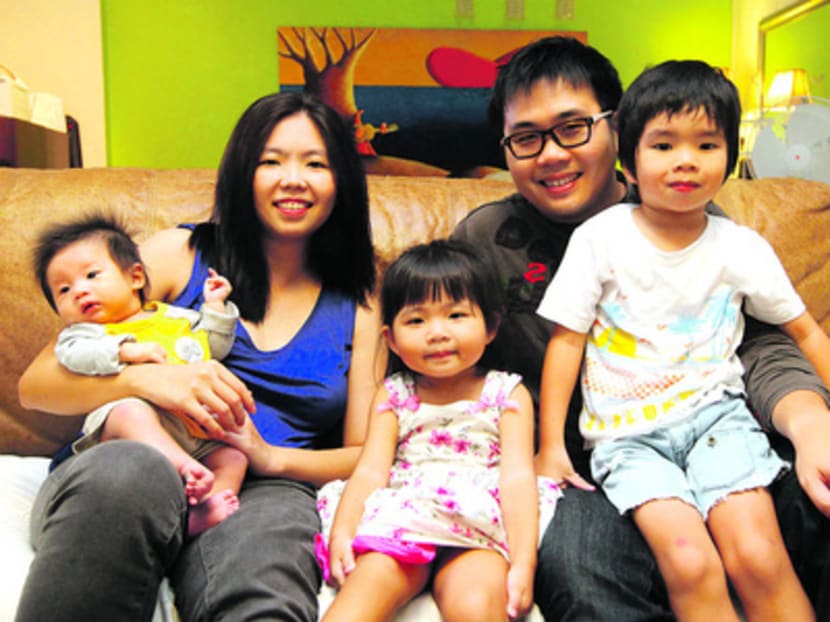 Kelvin Kao and his wife Daphne Ling, with their three children Finn Kao, Kirsten Kao and Truett Kao in their home on 25 Oct 2012. Photo by OOI BOON KEONG.