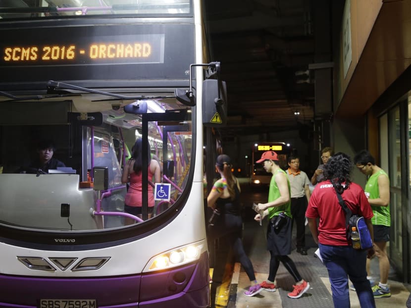 Participants at this year's Standard Chartered Marathon Singapore gave favourable reviews of the way the event was organised, especially the bus-ferrying services which were provided in the wee hours of the morning. Photo: Wee Teck Hian/TODAY
