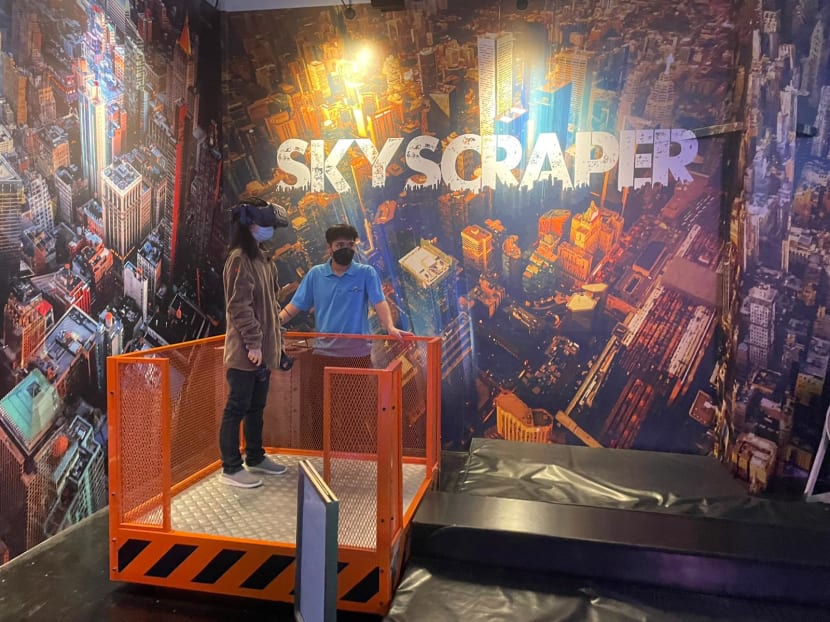 The author, seen here at Sentosa’s Head Rock VR, which provides VR experiences in themed zones.