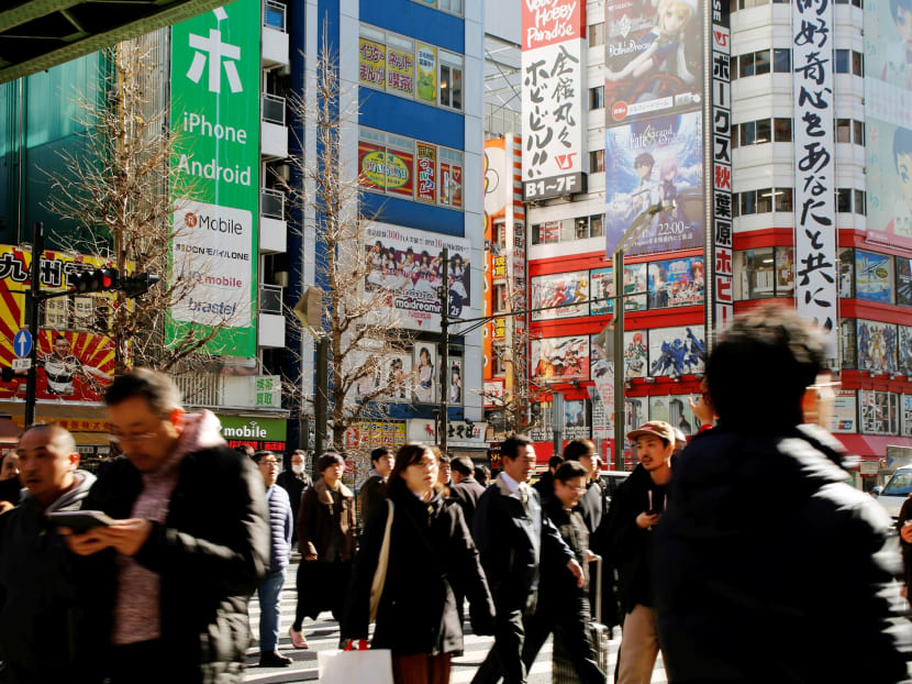 People at the Akihabara shopping district in Tokyo. Photo: REUTERS