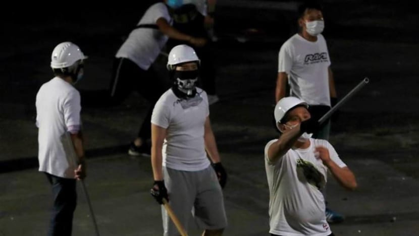 'Triad' attack on Hong Kong protesters sparks anger 'Triad' attack on Hong Kong protesters sparks anger