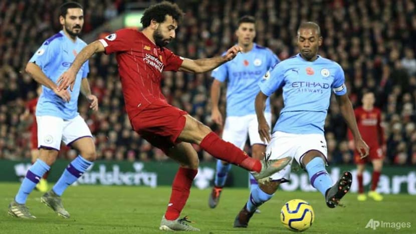 Football: Liverpool beat Man City to open up eight-point Premier League lead