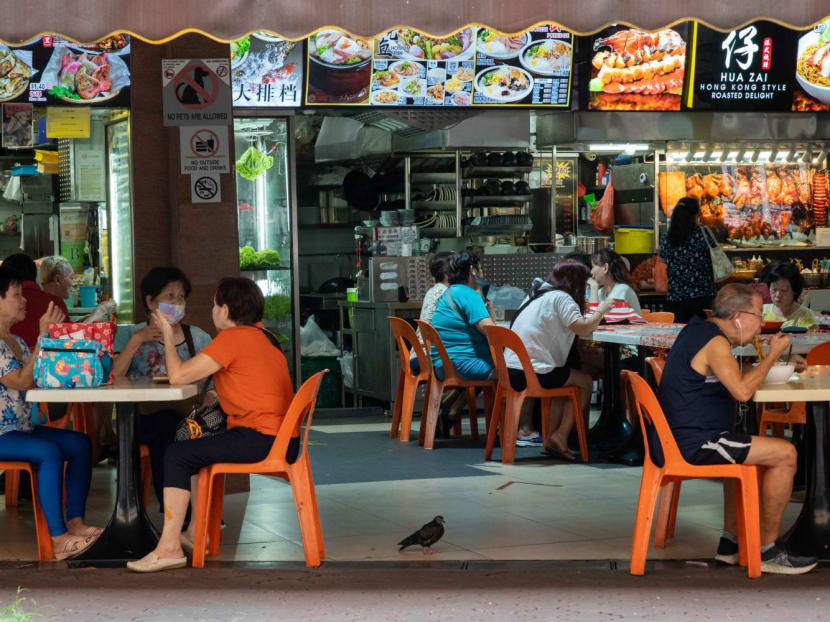 Patrons eating at a coffee shop in Tampines. 
