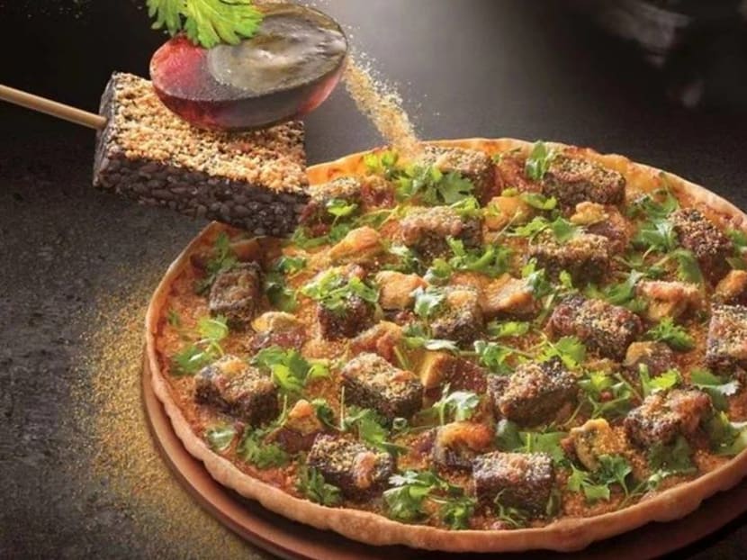 Pizza Hut Taiwan’s latest offering is made with century egg, pig’s blood cake