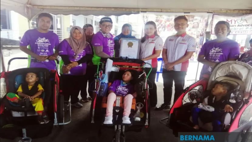 Kanak-kanak palsi serebrum cipta rekod kayuh basikal 222.2km rentas M'sia-Thailand