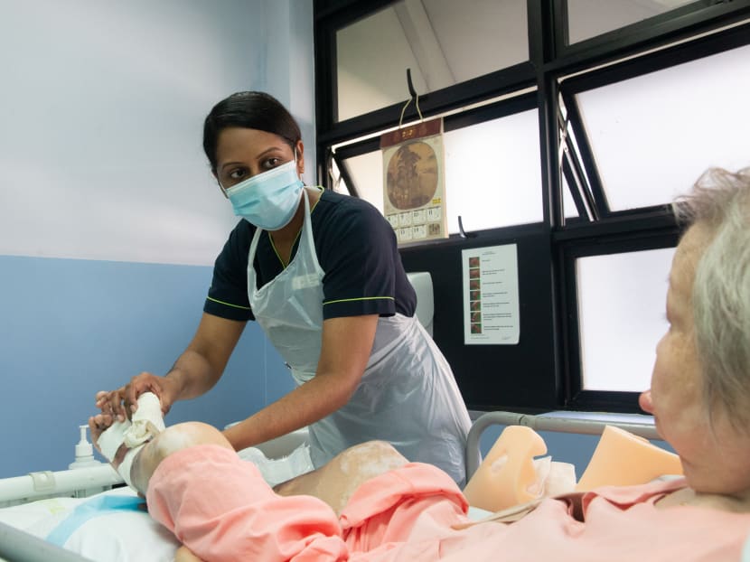 Ms Kavitha Sanmugam, an advance practice nurse, caring for a patient in St Luke’s Hospital. Ms Kavitha Sanmugam, an advance practice nurse, caring for a patient in St Luke’s Hospital.