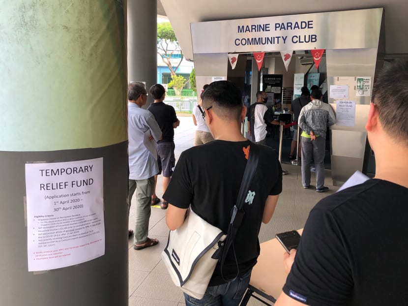 Applicants queuing to apply for the Temporary Relief Fund at Marine Parade Community Club on April 1, 2020.