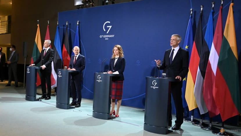 Scholz warns Russia of consequences if it invades Ukraine Scholz warns Russia of consequences if it invades Ukraine
