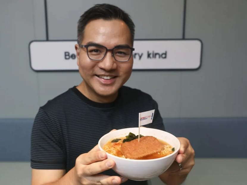 Green Monday founder David Yeung with a bowl of instant noodles with OmniPork Luncheon and kimchi. Green Monday founder David Yeung with a bowl of instant noodles with OmniPork Luncheon and kimchi.