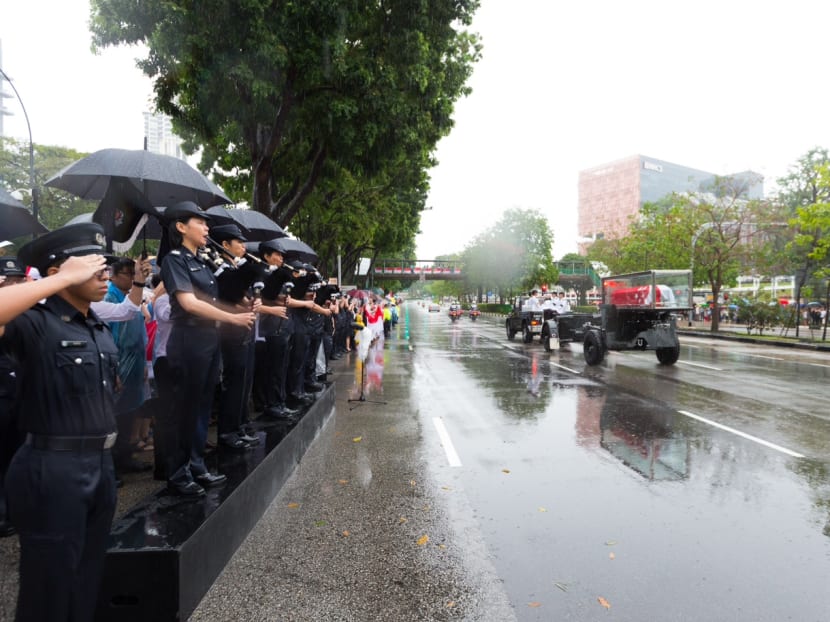 Bagpipe players from the Singapore Police Force Band who played as the gun carriage carrying the late Mr Lee Kuan Yew drove by outside the Police Cantonment Complex. Photo: Singapore Police Force