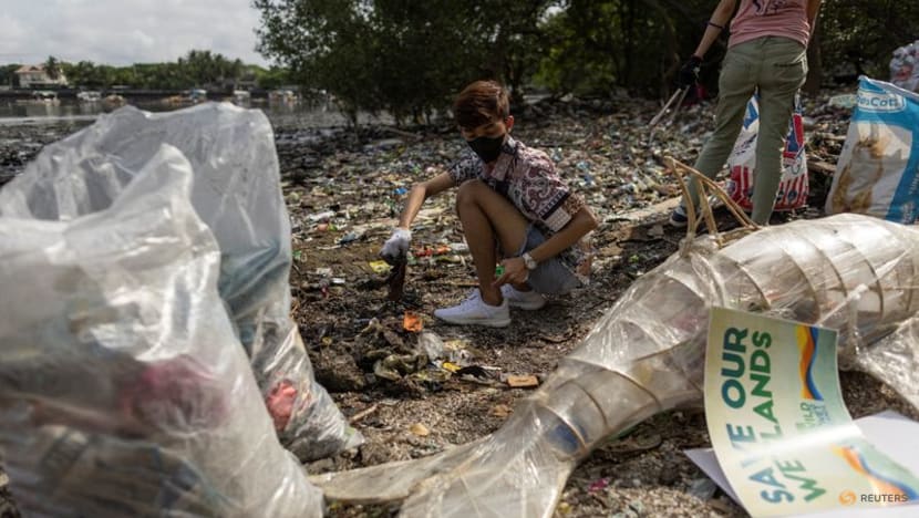 Cleanup day comes to Philippine capital's polluted bay 2 2022 09 17t080841z 1 lynxmpei8g027 rtroptp 3 cleanup day philippines