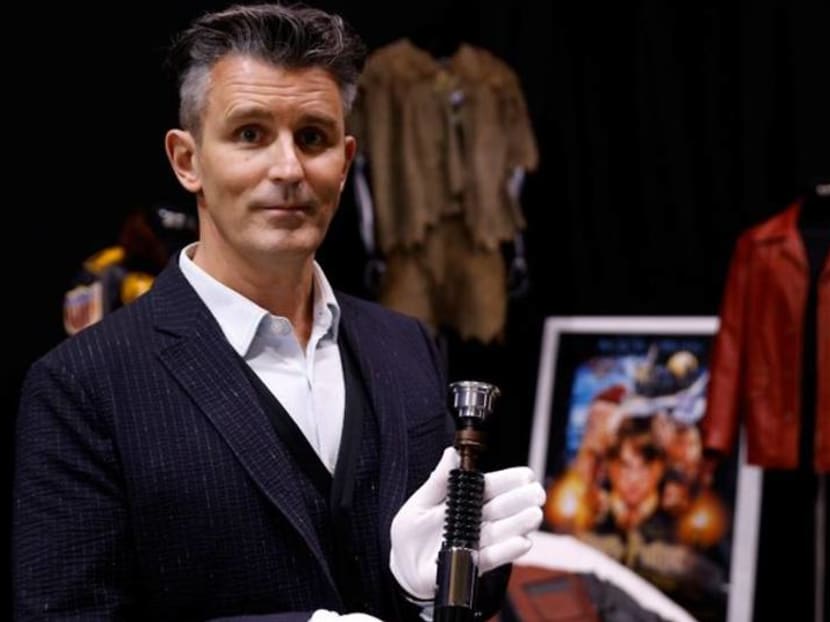 Star Wars lightsaber, Pretty Woman boots up for sale in movie memorabilia auction Star Wars lightsaber, Pretty Woman boots up for sale in movie memorabilia auction