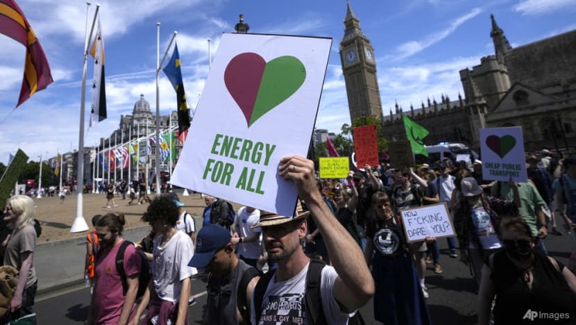 Protesters in UK decry climate change after record heatwave Protesters in UK decry climate change after record heatwave